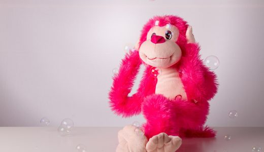 Pink monkey to with hands over ears, implying they are ignoring things.
